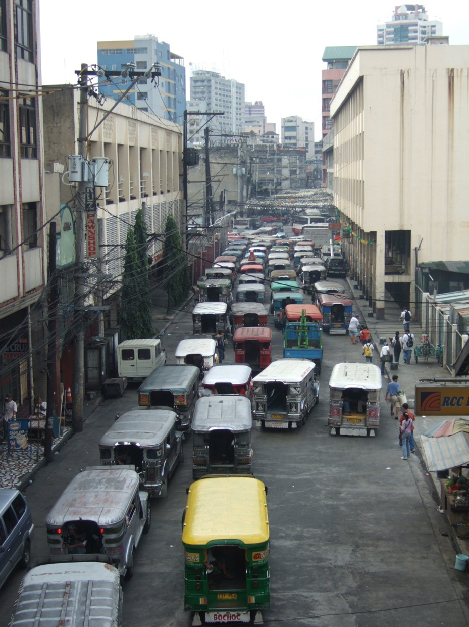 Fig. 16.1 The plethora of many small vehicles providing public transport services in cities such as Manila translates into significant system inefficiencies.