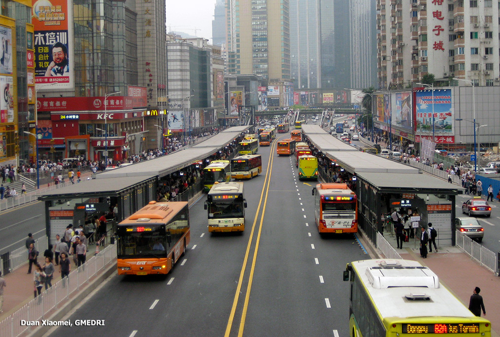 Fig. 8.2 The Gangding BRT station in Guangzhou, China. Despite 24 meters being taken from the center of the roadway for the BRT stations and roadways, both capacity and speed of the road for mixed traffic and buses improved dramatically. Conditions for pedestrians were also greatly improved, with customers waiting in the station rather than on the side of the road.