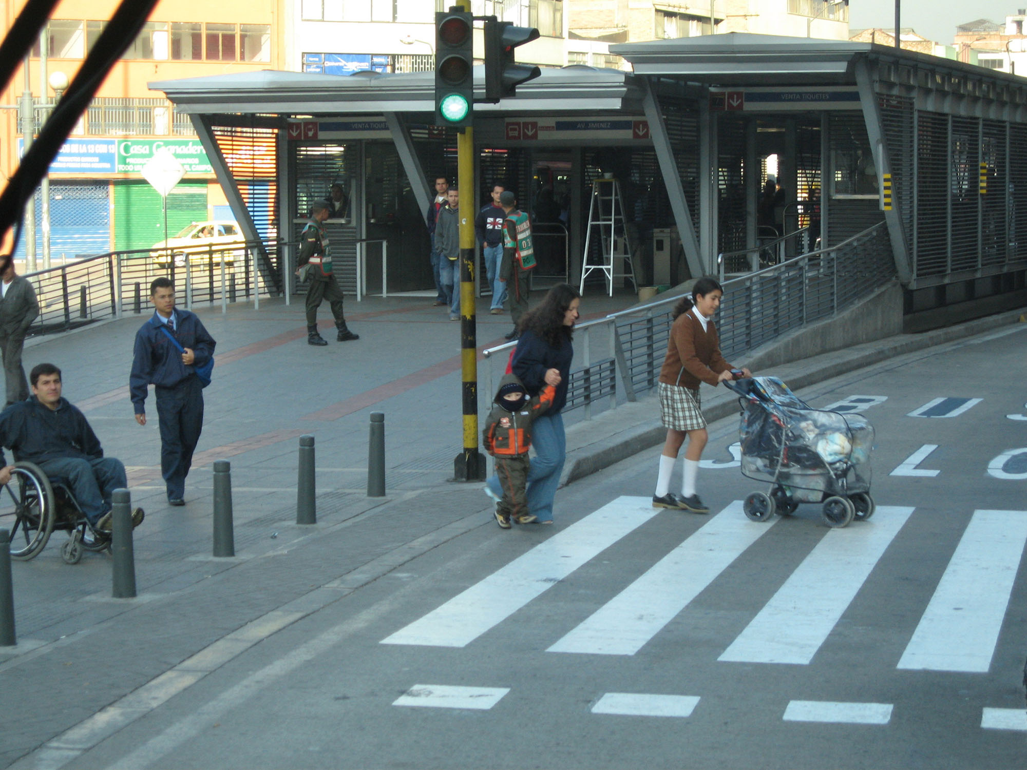 Fig. 29.15 Designing for the physically disabled also helps families with strollers and others carrying bicycles or large packages as shown at the Avenida Jimenez station in Bogotá.